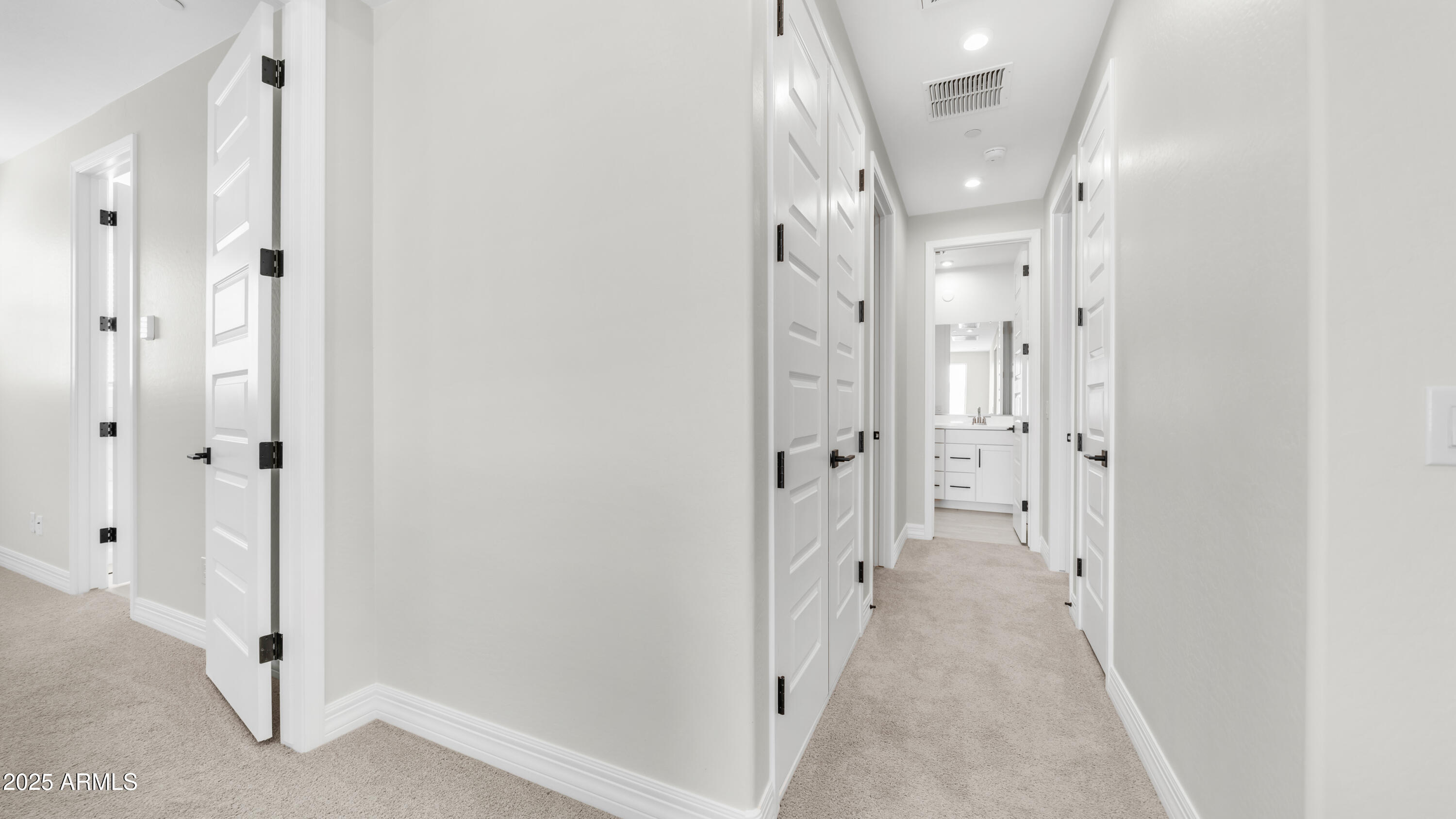 13359 West Eagle Feather Road Peoria, AZ 85383 - Photo 15 of 33 a view of a hallway with a dining area
