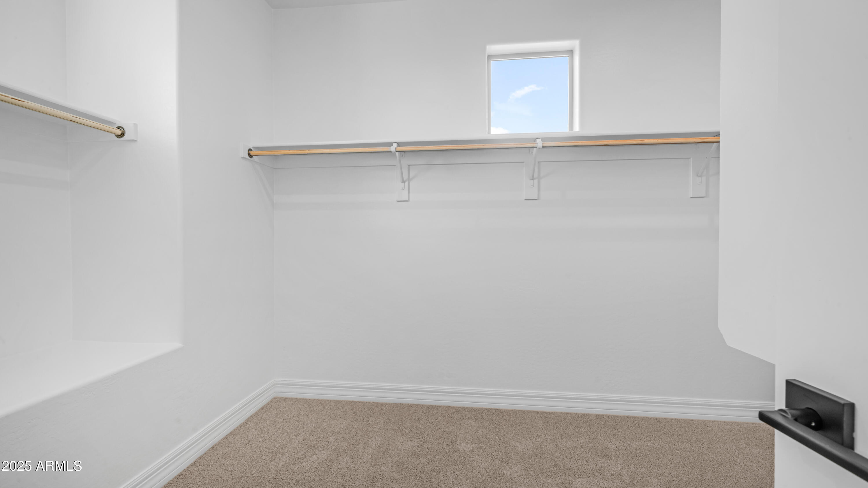 13359 West Eagle Feather Road Peoria, AZ 85383 - Photo 20 of 33 a view of an empty walk in closet