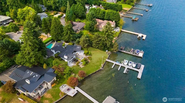 an aerial view of residential house with outdoor space and street view