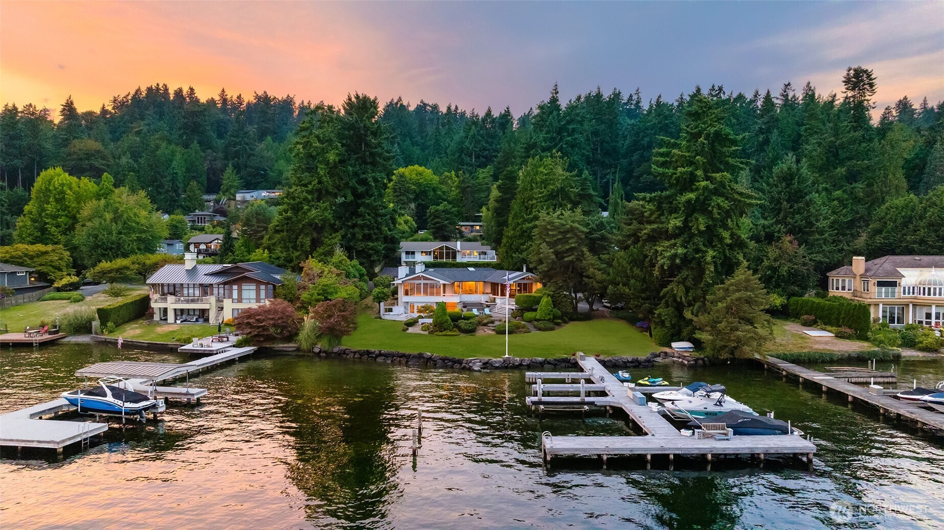 4802 East Mercer Way Mercer Island, WA 98040 - Photo 2 of 33 a aerial view of a house with a garden and lake view