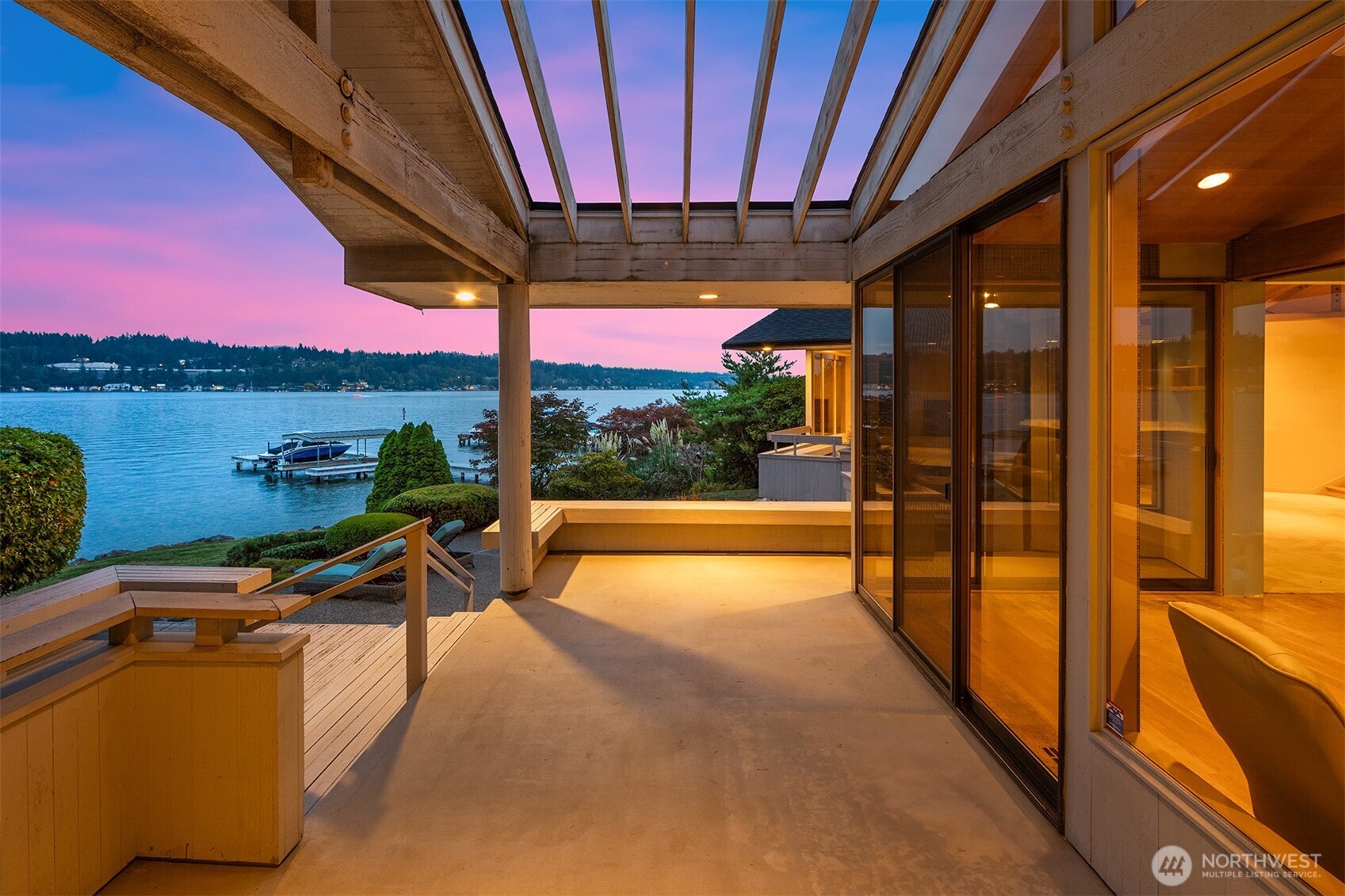 4802 East Mercer Way Mercer Island, WA 98040 - Photo 4 of 33 a view of swimming pool with a table and chairs in front of it