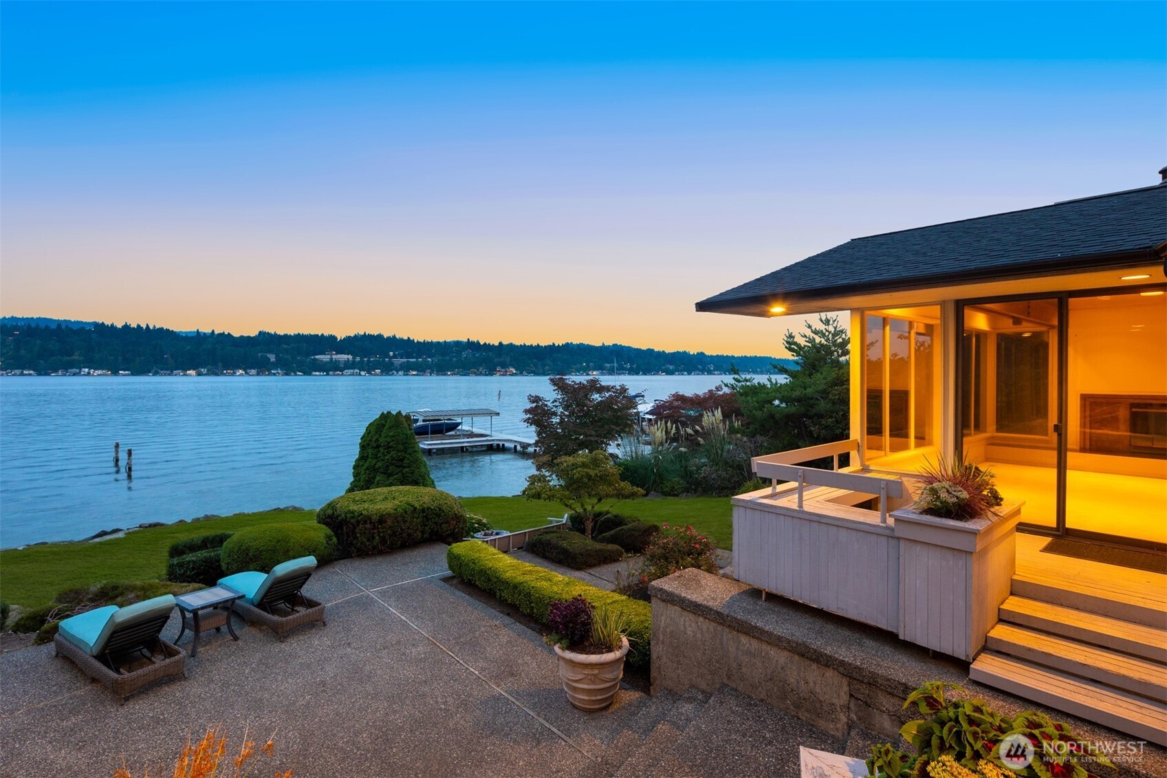 4802 East Mercer Way Mercer Island, WA 98040 - Photo 5 of 33 a view of a backyard with plants and outdoor seating
