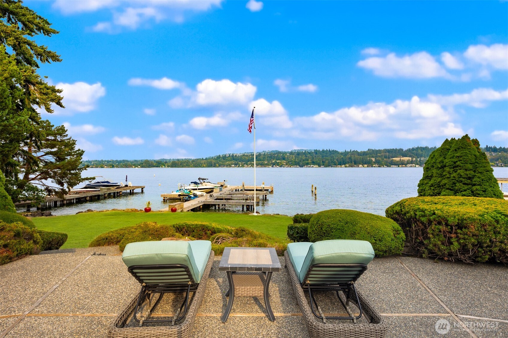 4802 East Mercer Way Mercer Island, WA 98040 - Photo 6 of 33 a view of a lake with couches chairs city lake view