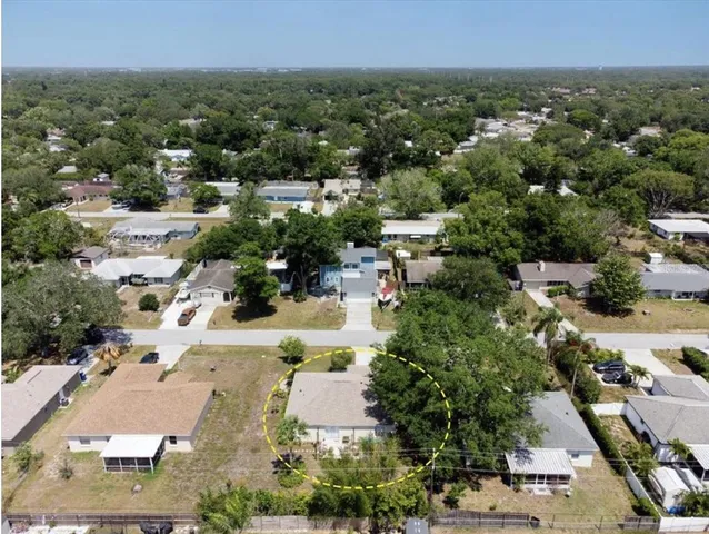 an aerial view of a city with lots of residential buildings