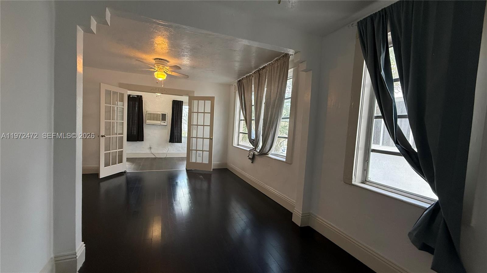 2153 Southwest 14th Terrace, Unit 4 Miami, FL 33145 - Photo 4 of 14 a view of gallery with wooden floor