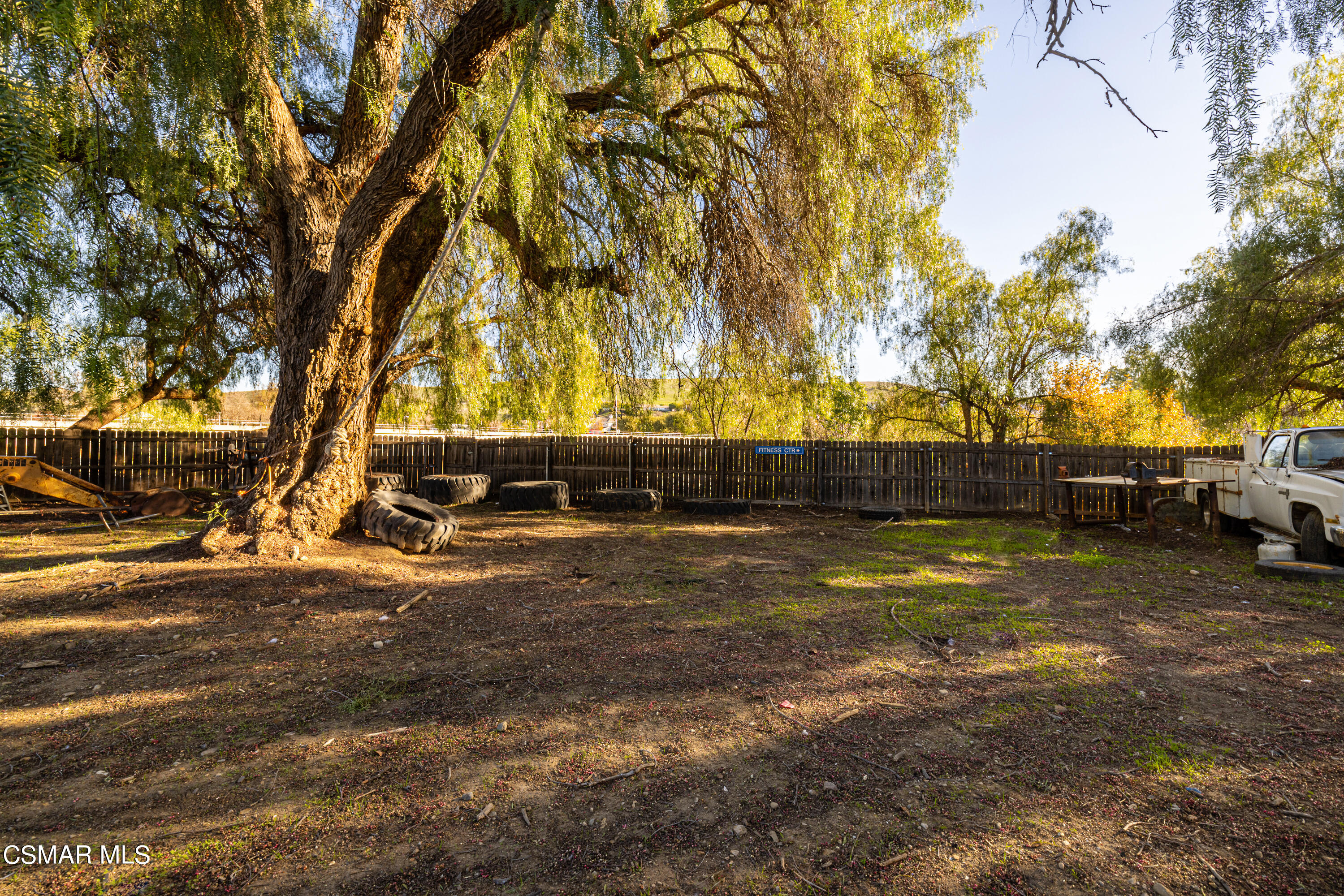 1328 Olympic Street Simi Valley, CA 93063 - Photo 21 of 23 a view of yard with swimming pool and trees