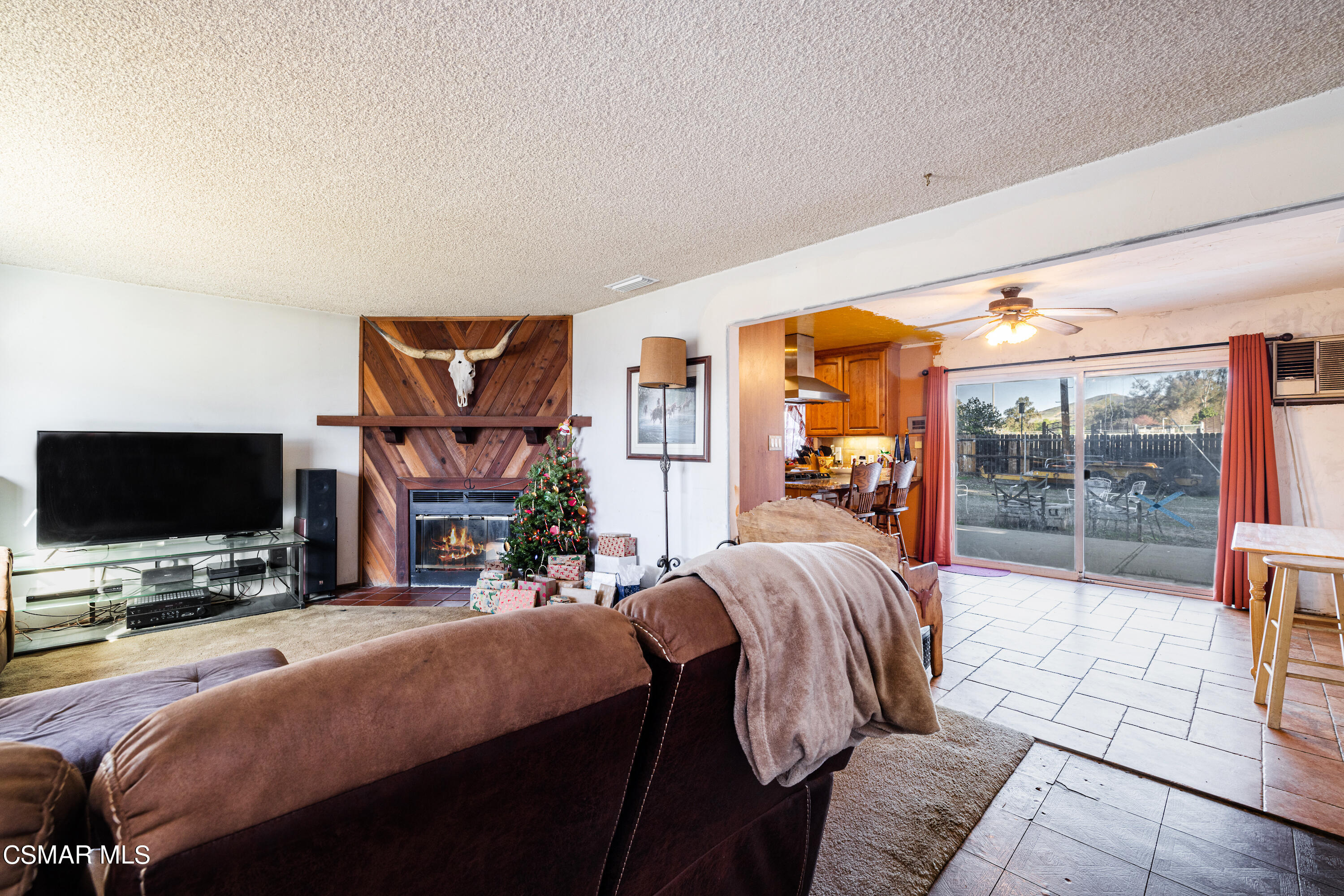 1328 Olympic Street Simi Valley, CA 93063 - Photo 3 of 23 a bedroom with a bed and glass door