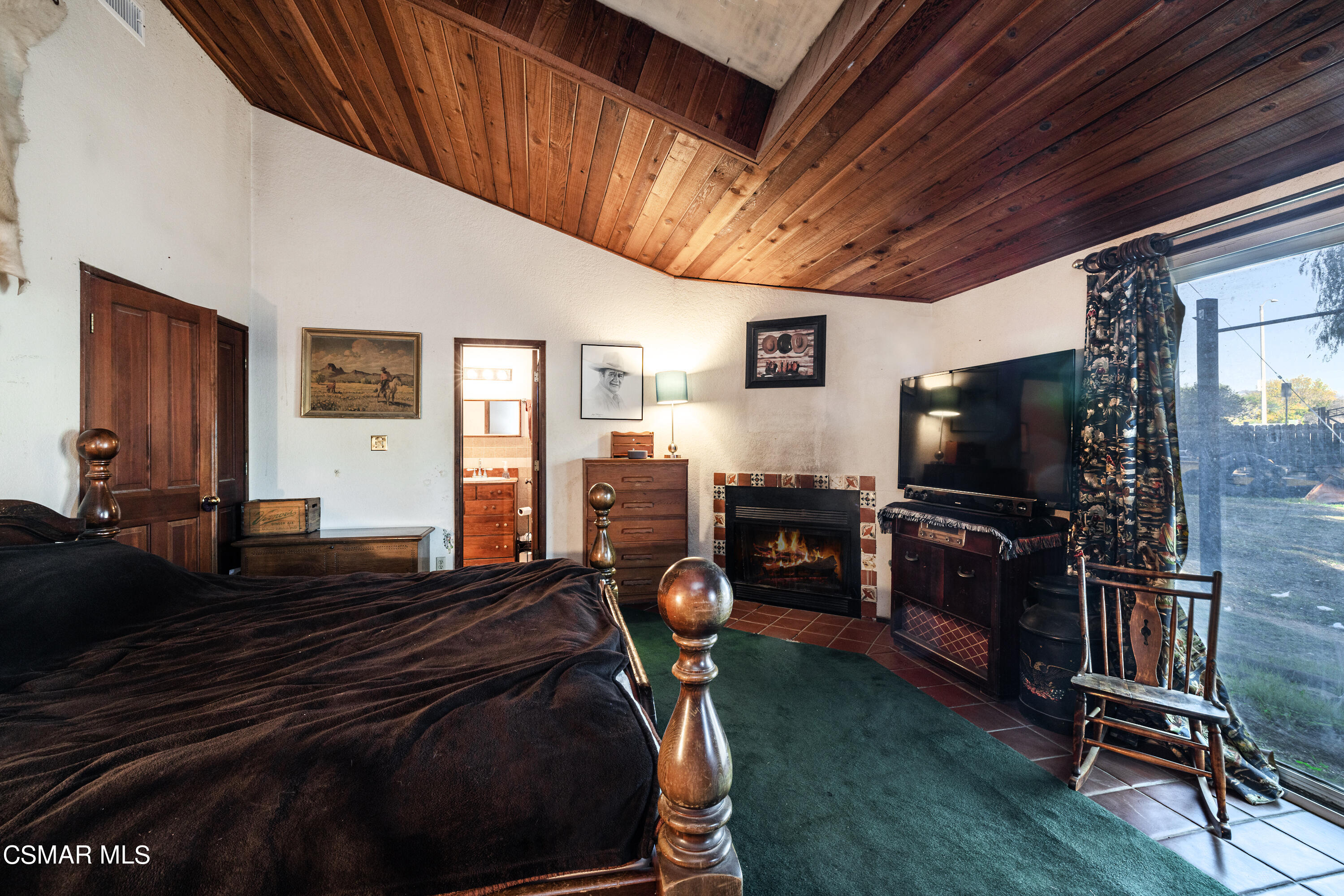 1328 Olympic Street Simi Valley, CA 93063 - Photo 9 of 23 a living room with furniture and a flat screen tv