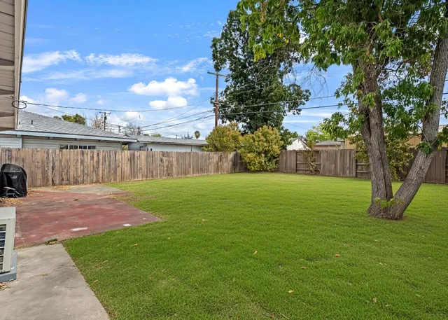 a view of a backyard with a garden