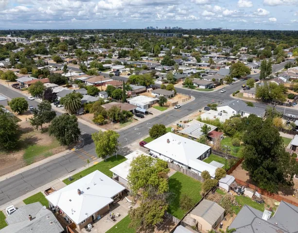an aerial view of a house with a garden