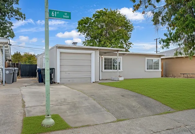 a house view with a garden space