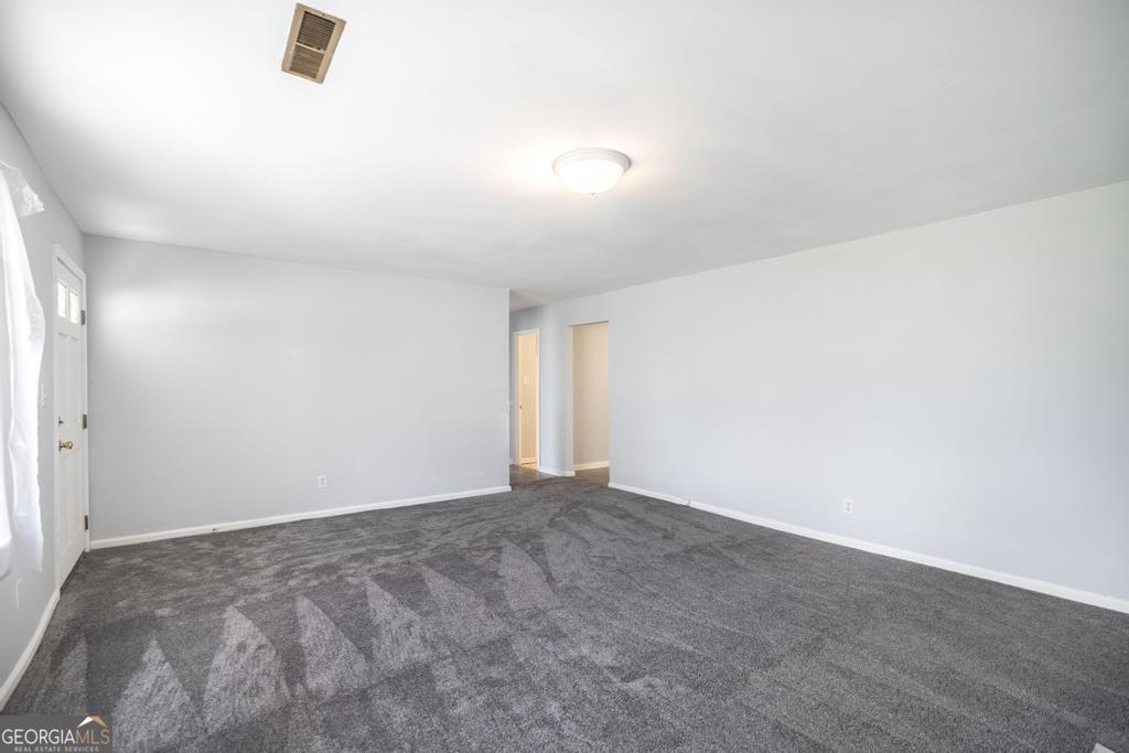 918 Henderson Street Dublin, GA 31021 - Photo 9 of 23 a view of an empty room