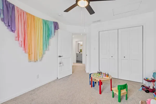 a bathroom with cabinets and a sink