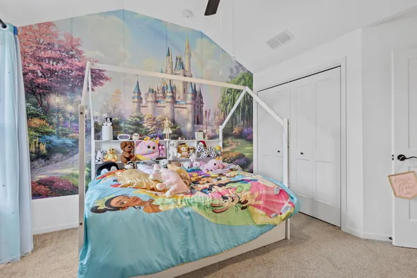 a en suite bathroom with double sink and a mirror