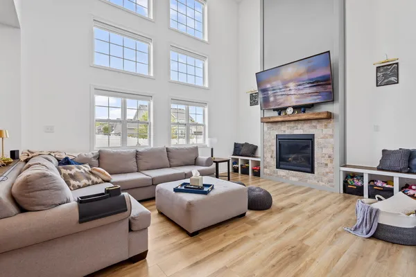 a fireplace with wooden floor in living room