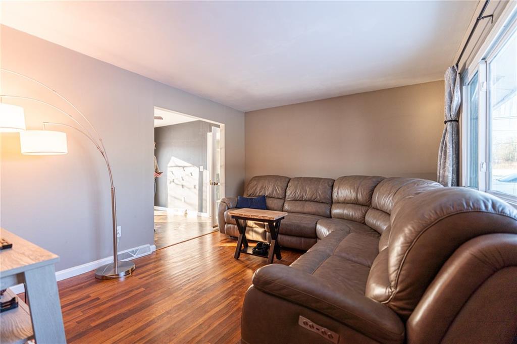 536 Butler Pike Mercer, PA 16137 - Photo 3 of 18 a living room with furniture and a wooden floor