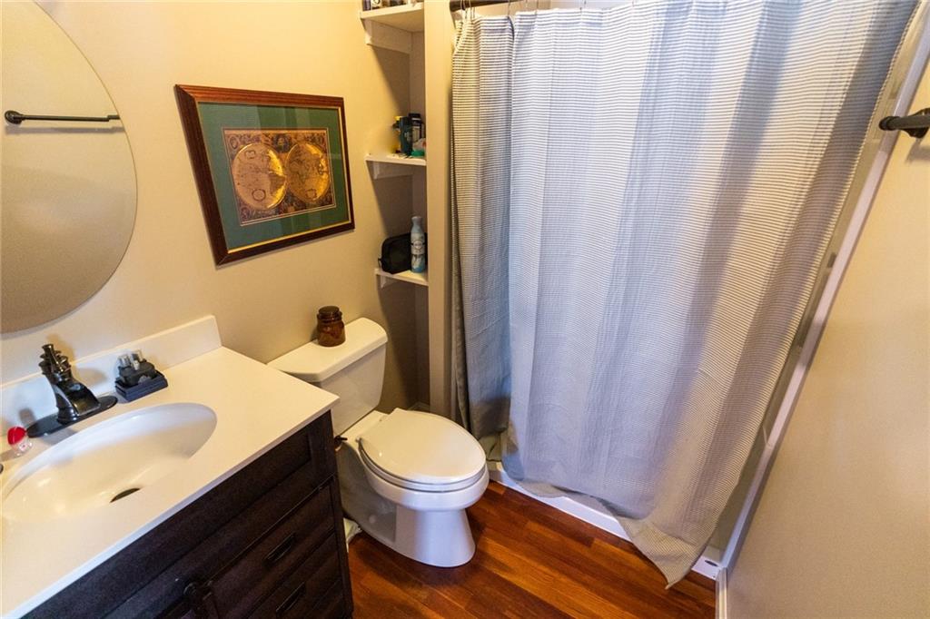 536 Butler Pike Mercer, PA 16137 - Photo 10 of 18 a bathroom with a toilet and a sink