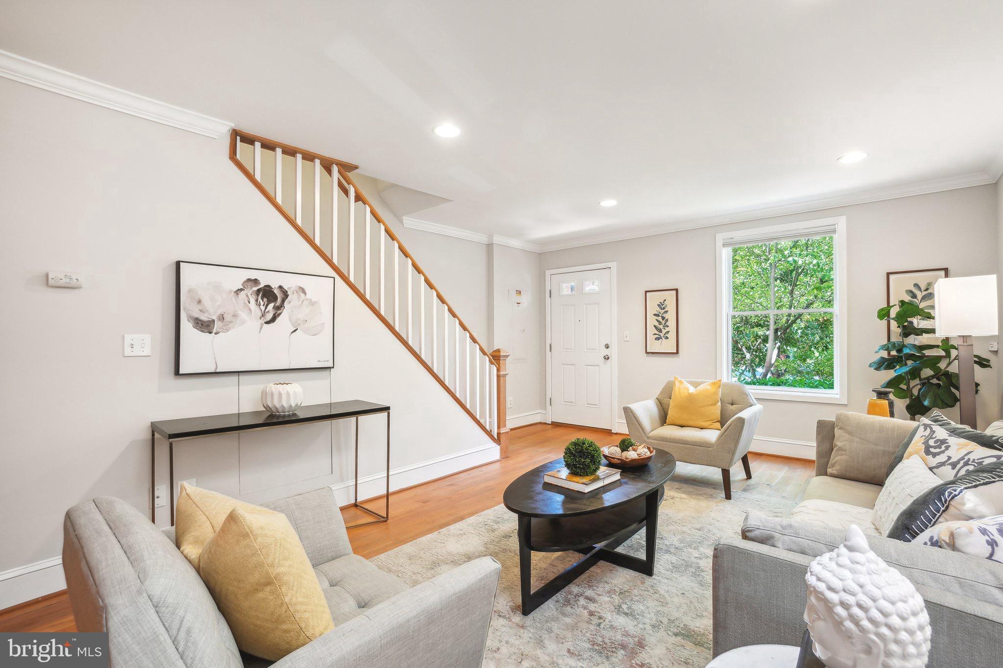 708 5th Street Southeast Washington, DC 20003 - Photo 2 of 25 a living room with furniture and a large window