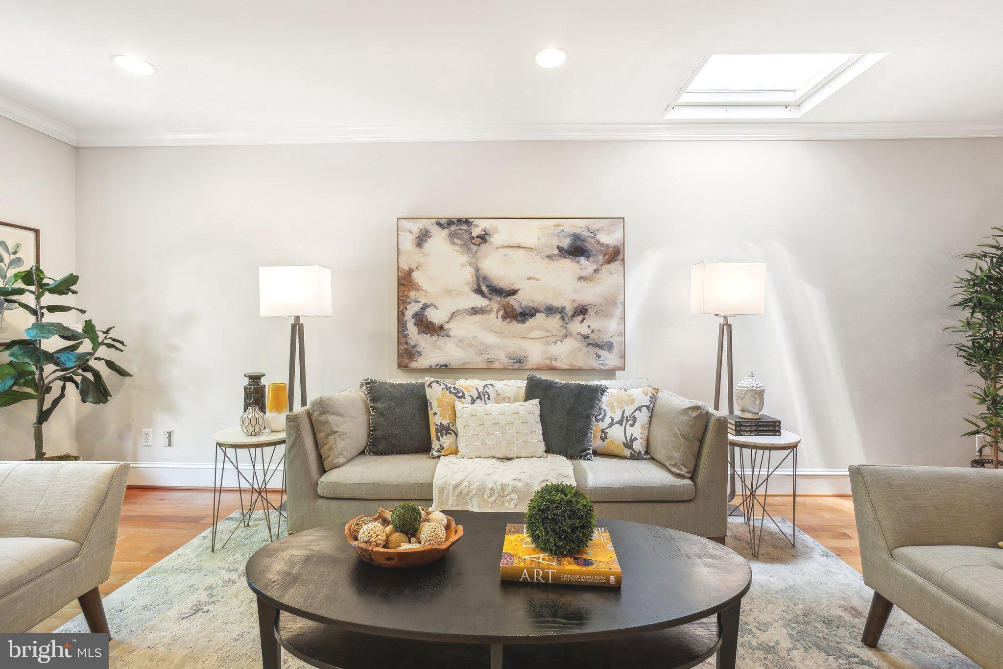 708 5th Street Southeast Washington, DC 20003 - Photo 4 of 25 a living room with furniture and a table