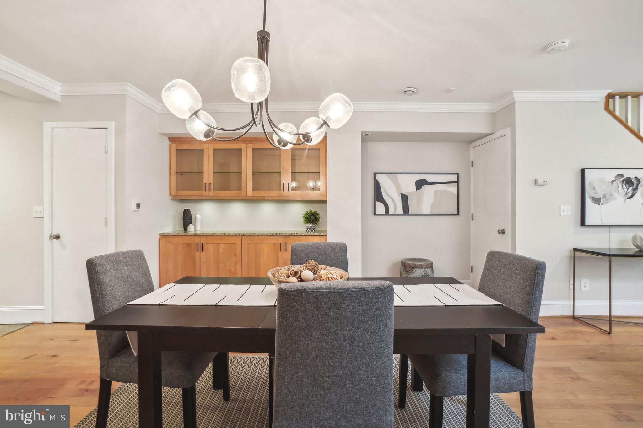 708 5th Street Southeast Washington, DC 20003 - Photo 5 of 25 a view of a dining room with furniture and wooden floor
