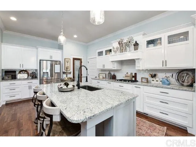 0 Firewater Julian, CA 92036 - Photo 5 of 16 a kitchen with granite countertop cabinets and refrigerator