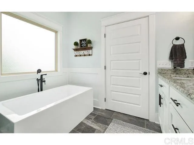 0 Firewater Julian, CA 92036 - Photo 10 of 16 a bathroom with a tub sink and mirror