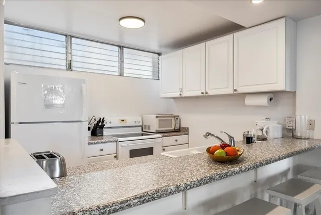 $875,000 | 2619 South Kihei Road, Unit A303, Kihei, HI 96753