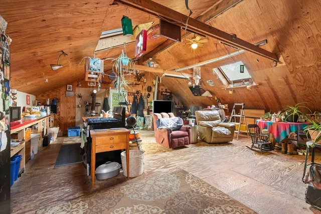 a view of a chairs and table in a patio