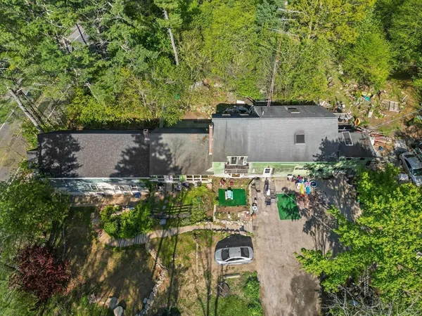 a backyard of a house with lots of green space