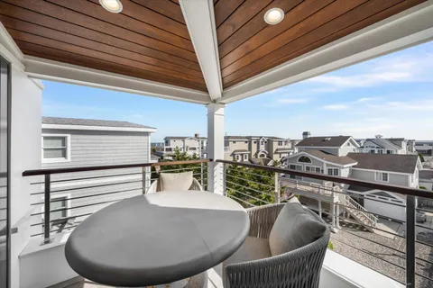 a view of roof deck with seating space