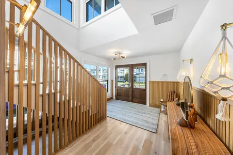 a view of entryway with wooden floor