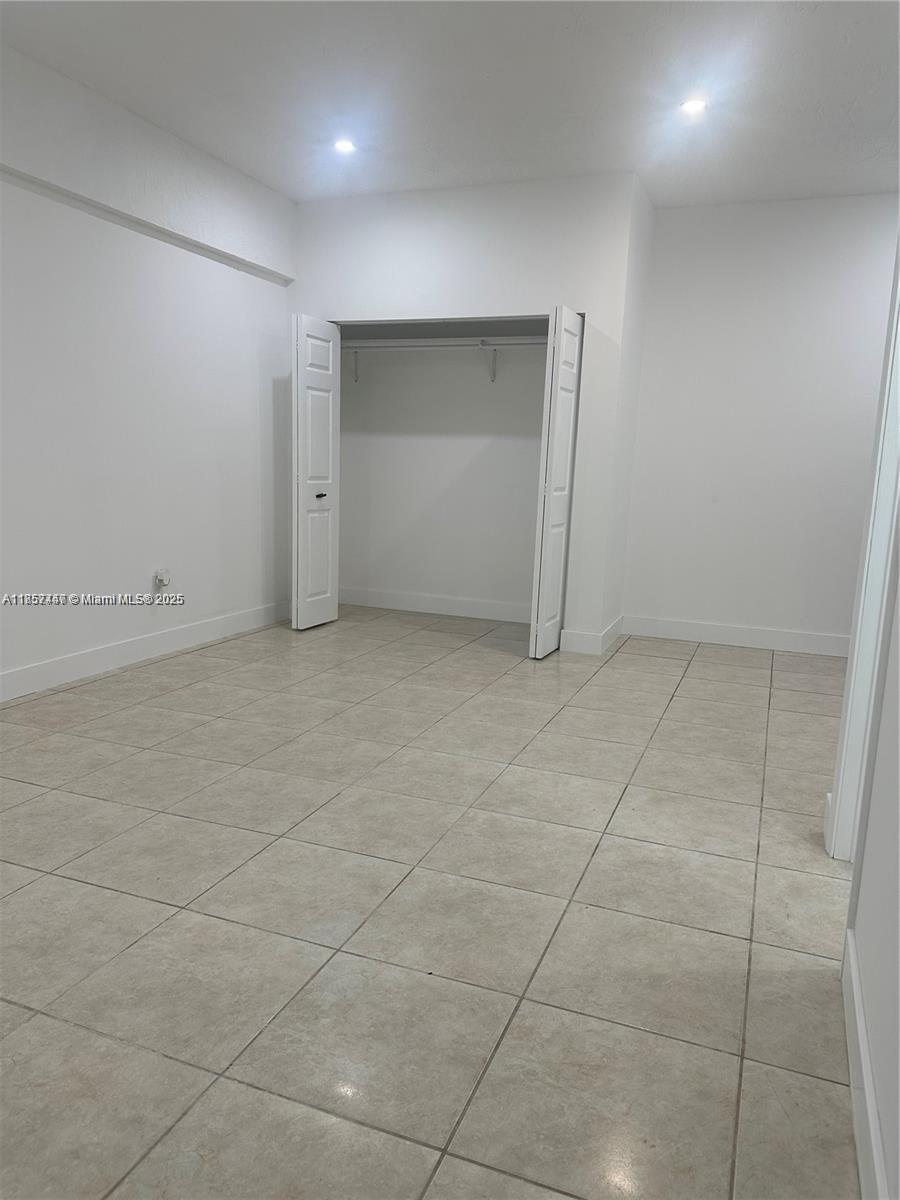 Eve Estates Homestead, FL 33033 - Photo 4 of 8 an empty room with a bathroom