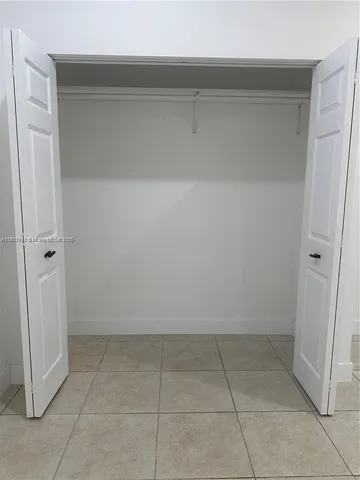 a bathroom with a mirror