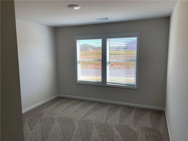 a view of a livingroom with a window
