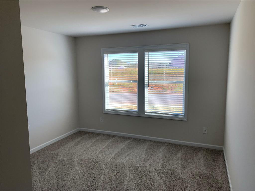 755 Rodeo Drive Auburn, GA 30011 - Photo 12 of 15 a view of a livingroom with a window