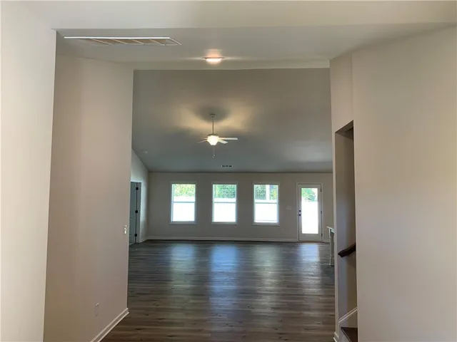 a view of livingroom and hardwood floor