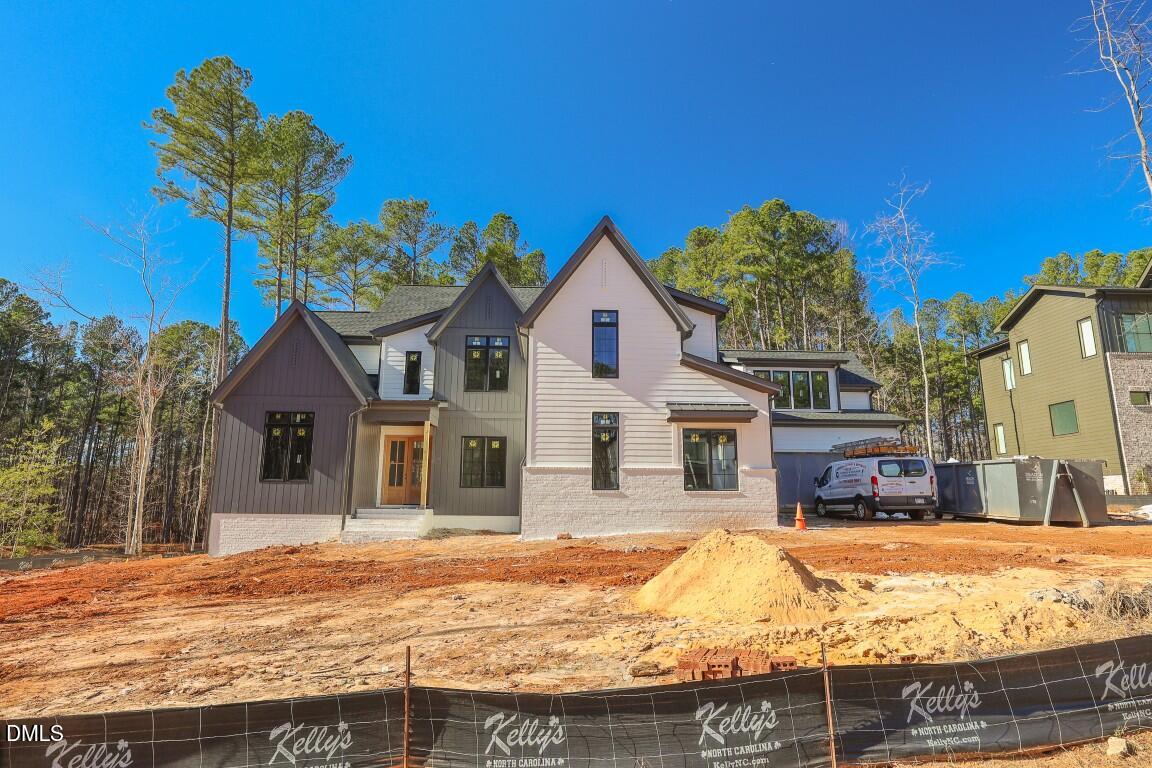 a view of swimming pool with a house in the background