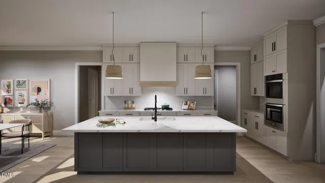 a kitchen with kitchen island a sink stainless steel appliances and cabinets