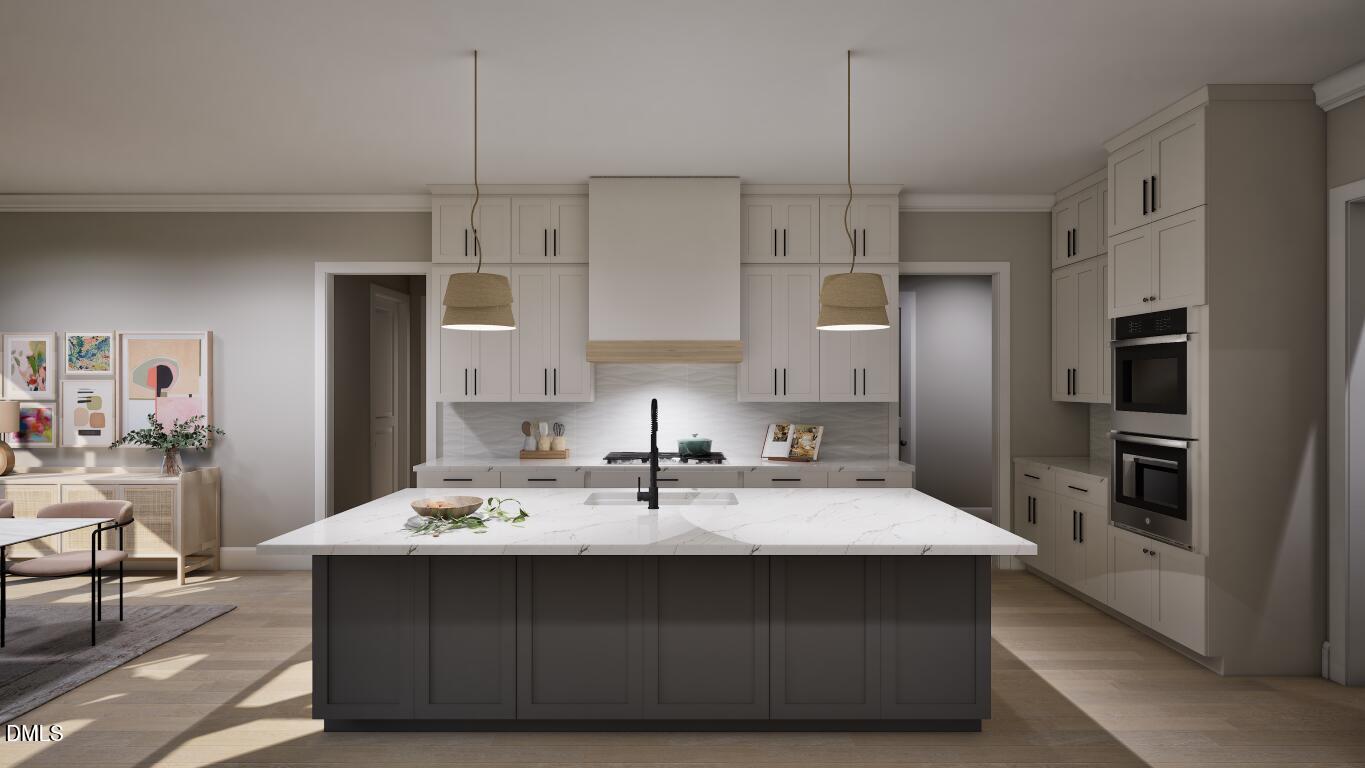 7429 Summer Tanager Trail Raleigh, NC 27614 - Photo 11 of 43 a kitchen with kitchen island a sink stainless steel appliances and cabinets