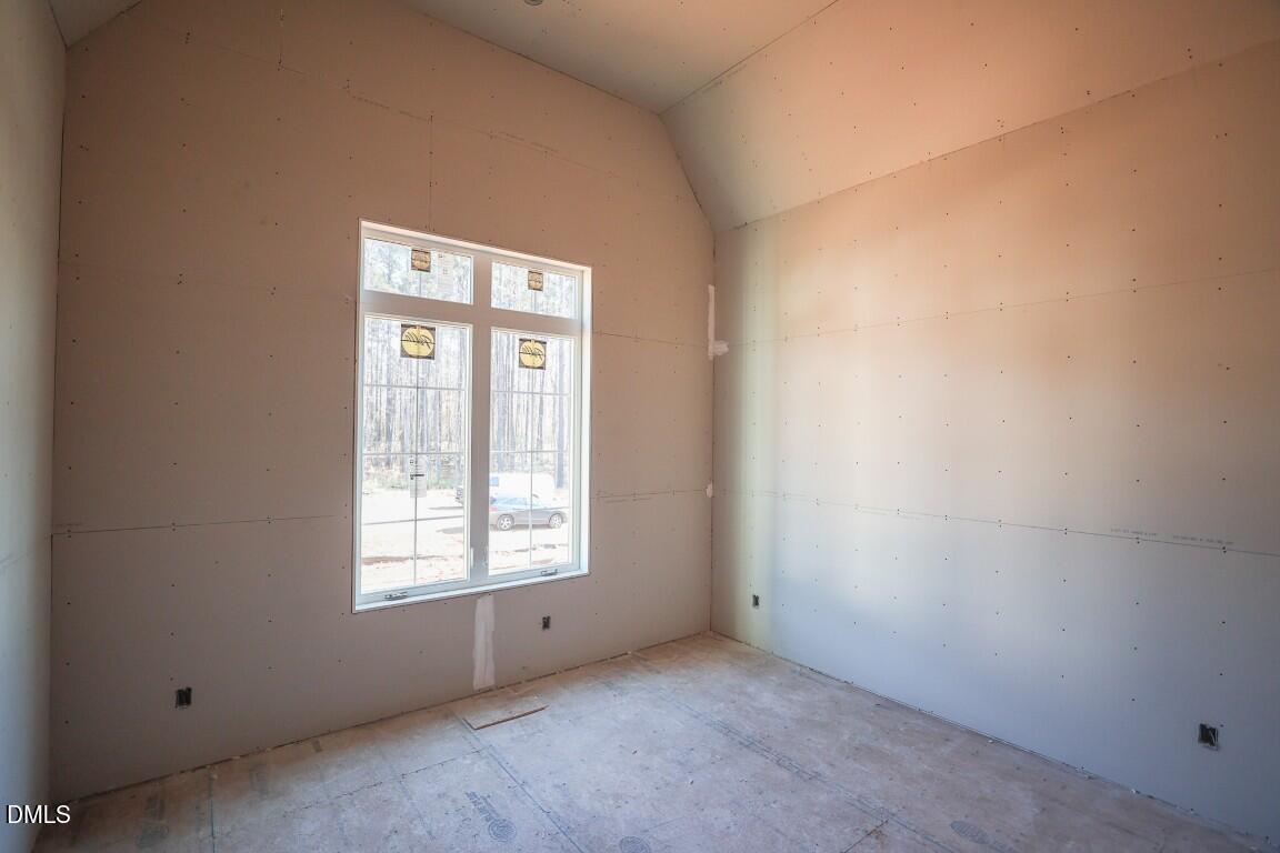 7429 Summer Tanager Trail Raleigh, NC 27614 - Photo 12 of 43 an empty room with windows