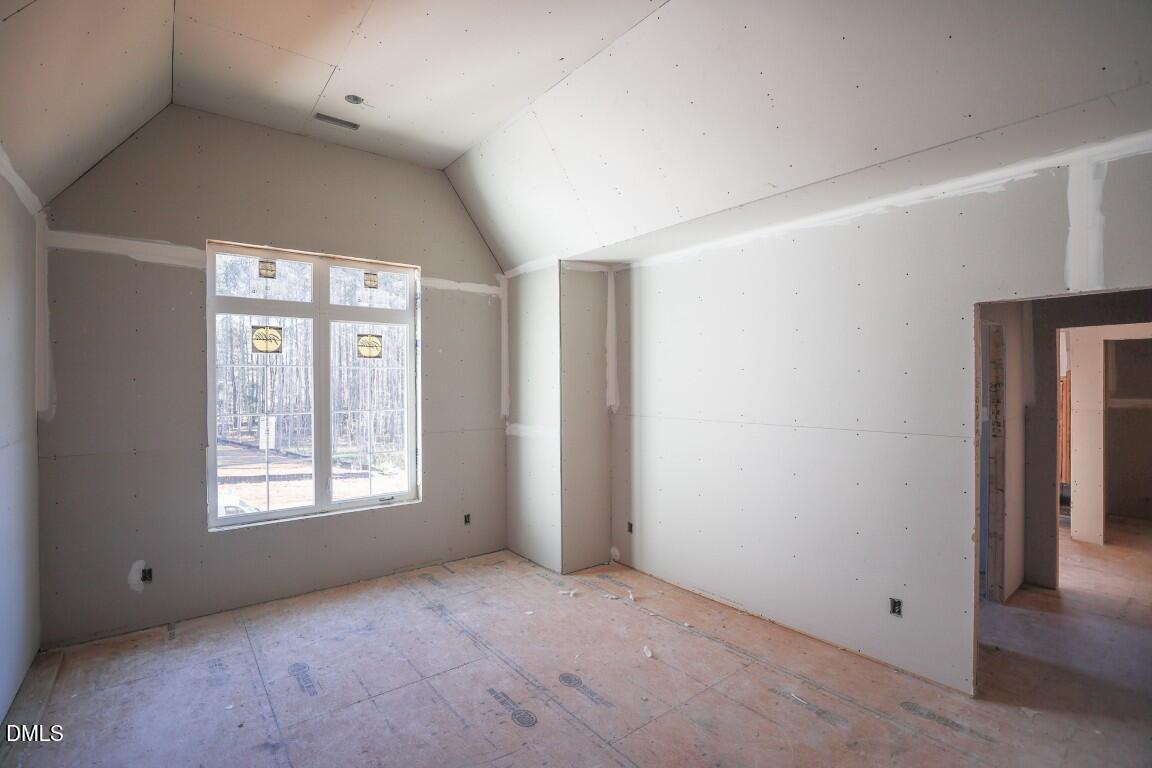 7429 Summer Tanager Trail Raleigh, NC 27614 - Photo 15 of 43 an empty room with windows and closet