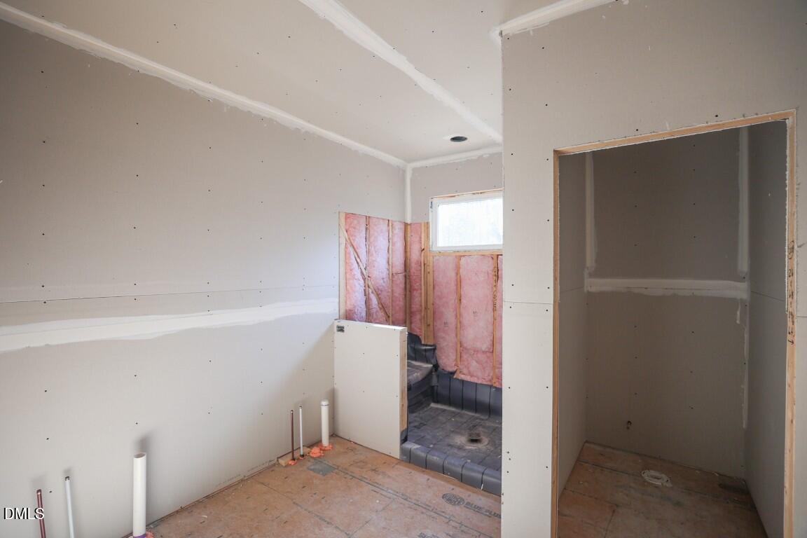 7429 Summer Tanager Trail Raleigh, NC 27614 - Photo 16 of 43 a bathroom with a sink and toilet