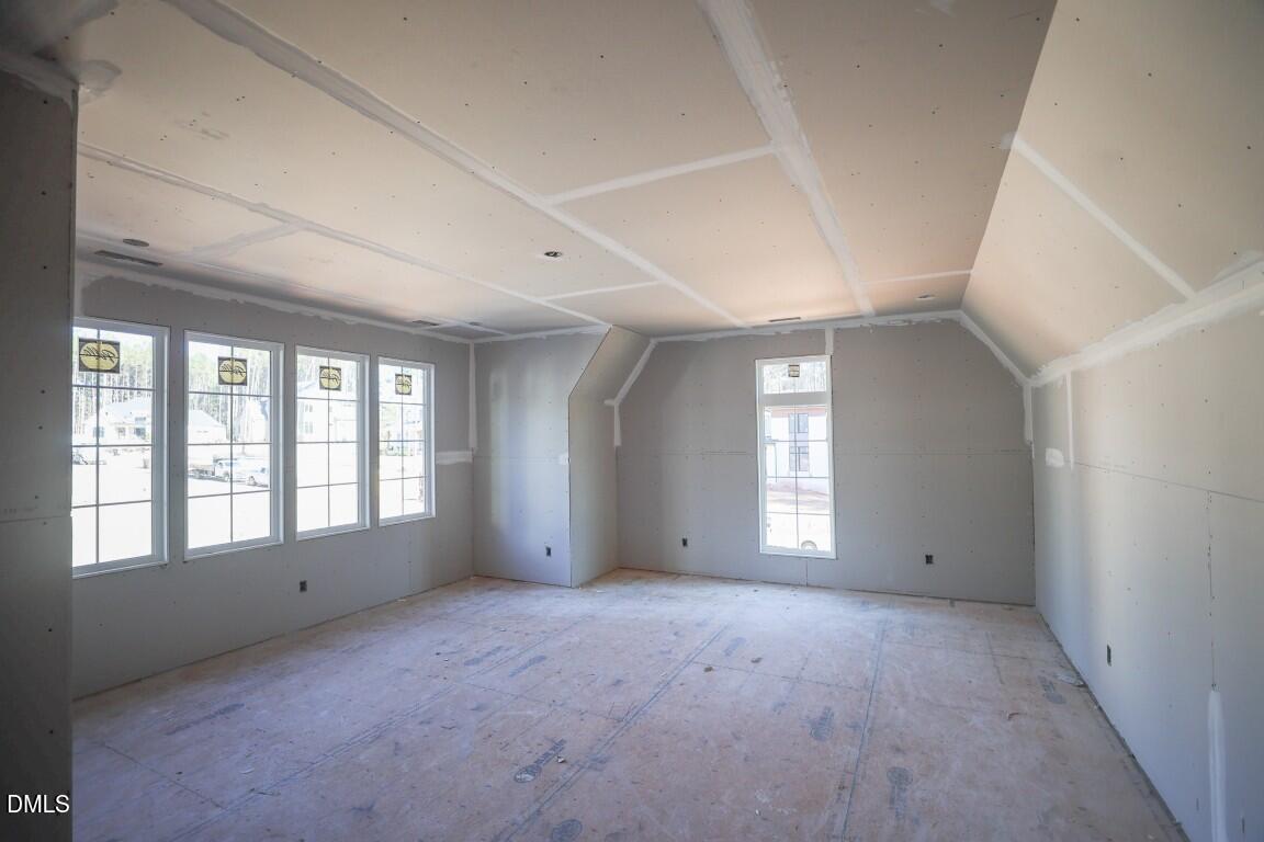 7429 Summer Tanager Trail Raleigh, NC 27614 - Photo 19 of 43 a view of an empty room with a window
