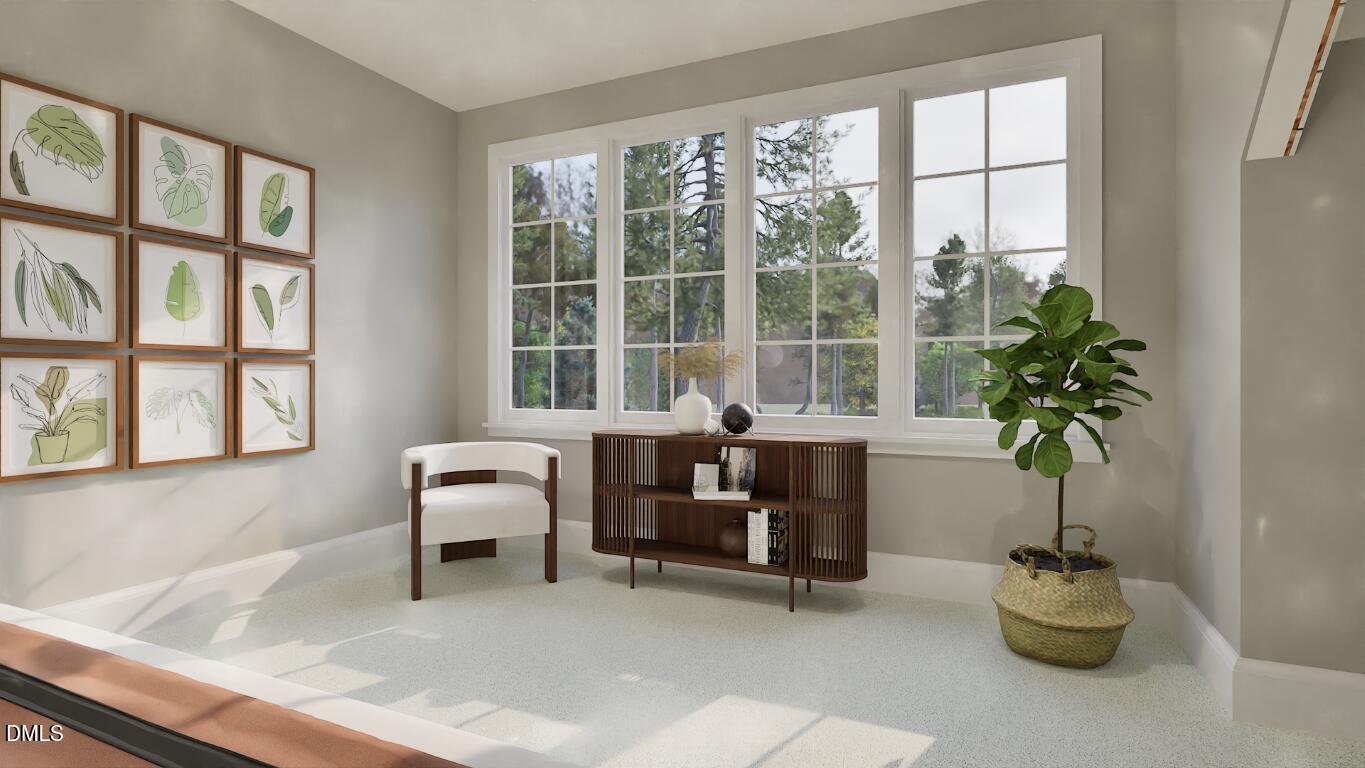 7429 Summer Tanager Trail Raleigh, NC 27614 - Photo 32 of 43 a living room with furniture and a potted plant
