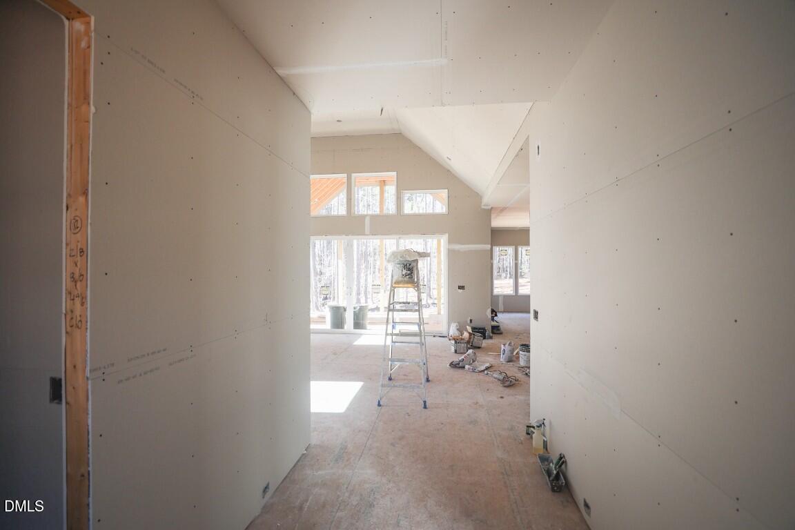 7429 Summer Tanager Trail Raleigh, NC 27614 - Photo 5 of 43 a living room with furniture and a large window