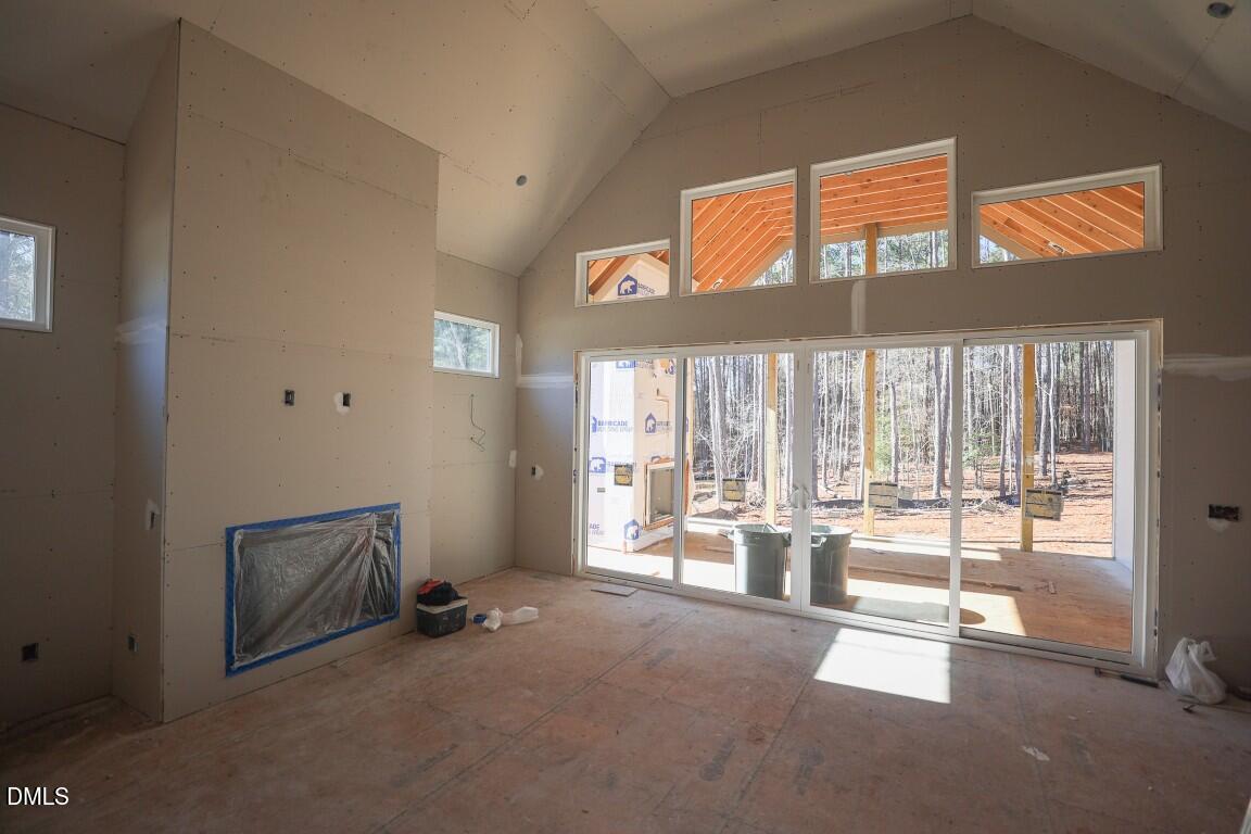 7429 Summer Tanager Trail Raleigh, NC 27614 - Photo 8 of 43 a room with a large window