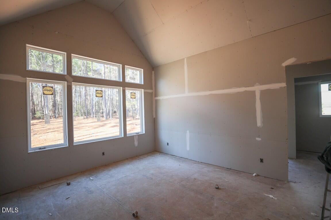 7429 Summer Tanager Trail Raleigh, NC 27614 - Photo 9 of 43 an empty room with a window