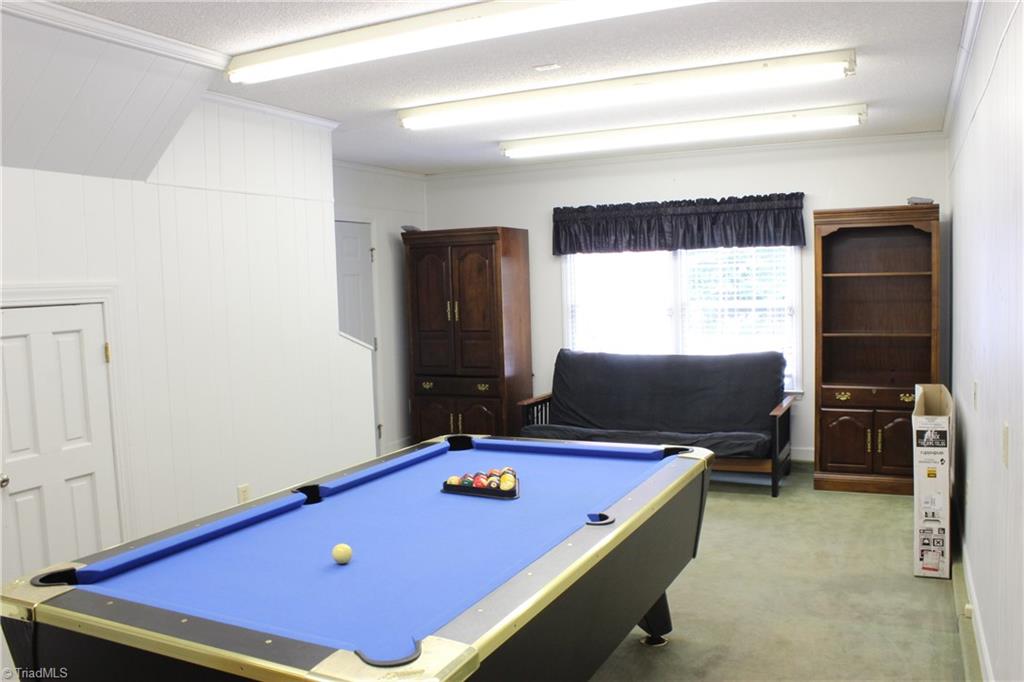 5705 Davis Mill Road Pleasant Garden, NC 27313 - Photo 27 of 30 Pool Room in half of detached garage. Table and furniture to remain.