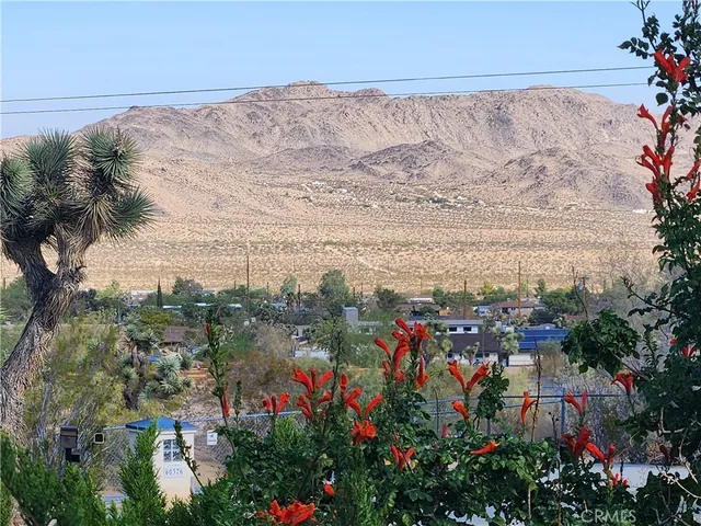 a view of lake and mountain