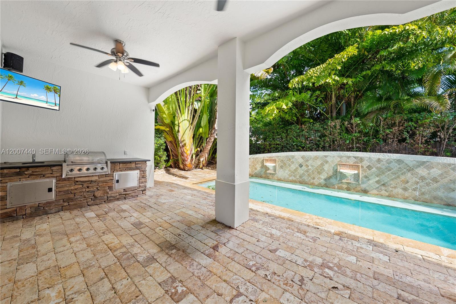 4065 Battersea Road Miami, FL 33133 - Photo 14 of 39 a view of a living room and hardwood floor
